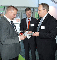 Photo: Mr. Jyrki Holmala, Head of Pulp and Energy business line, Valmet, greeting Mr. Timo Partanen, Fortum’s power plant manager. Mr. Markus Rauramo, CFO of Fortum, in the middle.