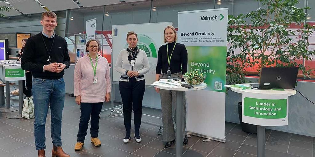 Valmet Beyond Circularity team members in front of an info stand