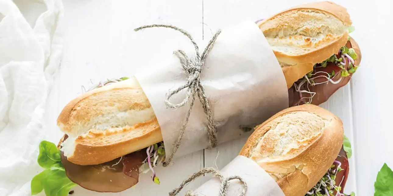 Baquettes wrapped up in white machine glazed (MG) kraft paper
