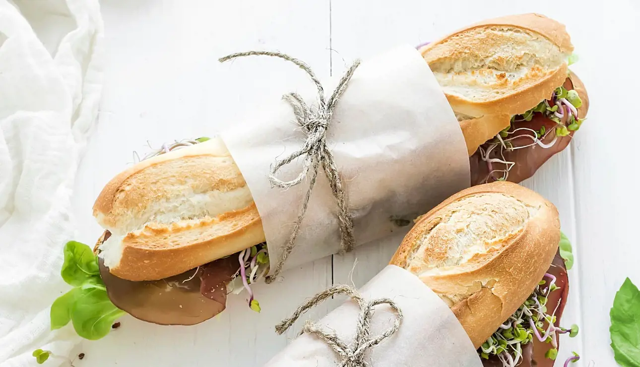 Baquettes wrapped up in white machine glazed (MG) kraft paper