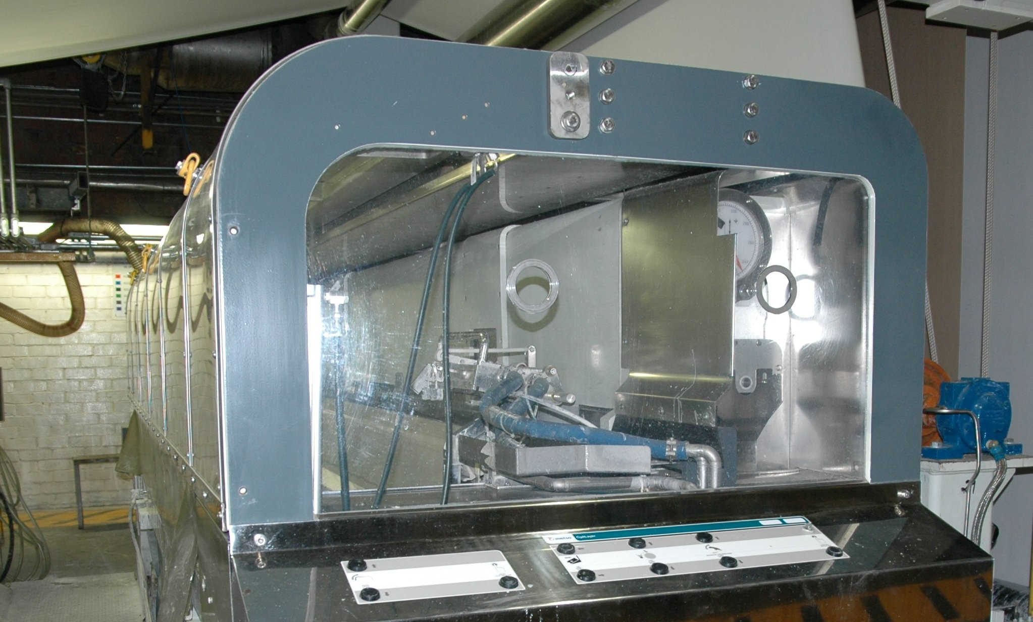 OptiCoat Layer curtain applicator applying two coat simultaneously