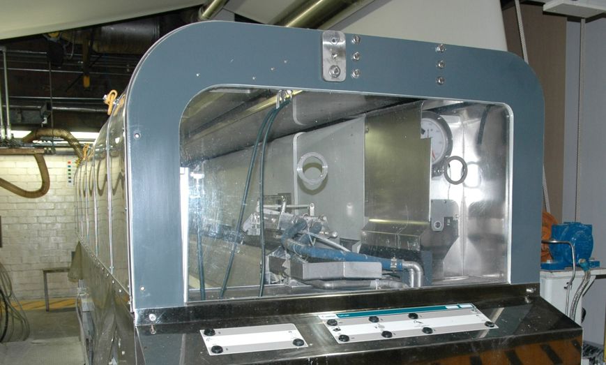 OptiCoat Layer curtain applicator applying two coat simultaneously