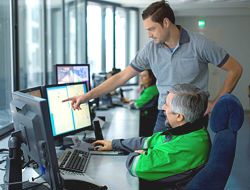 Valmet and mill person in control room