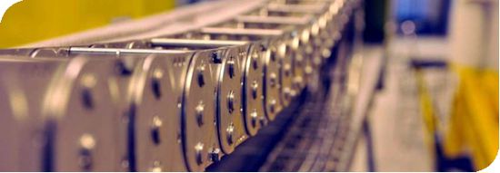 Traversing via gear motor and chain