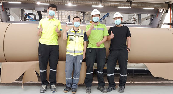 remote support expers and a local team helping to start-up a paper machine 