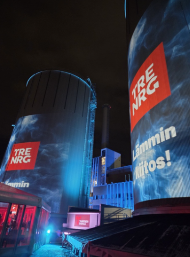 A large silos with a large screen

AI-generated content may be incorrect.