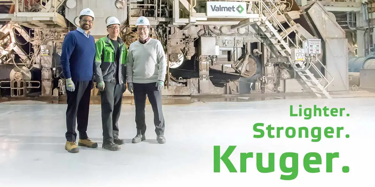Levesque, Patel and Muhonen smiling at the front of Kruger's PM10 Trois Rivieres, Canada