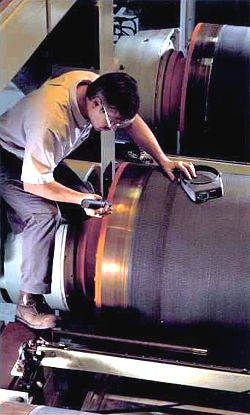 Look for unusual  wear or damage when the machine is down.