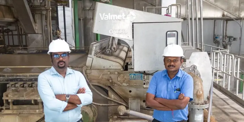 Mr. Rajithlal Janaki, Business Unit Head of Sri Andal and Mr. G Chellamuthu, General Manager of projects standing in front of an OptiFlo Foudrinier headbox