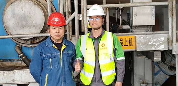 Yajun Sun Pulp Making and PDM Facility Manager and Yunhua Hu Mill Sales Manager.jpg