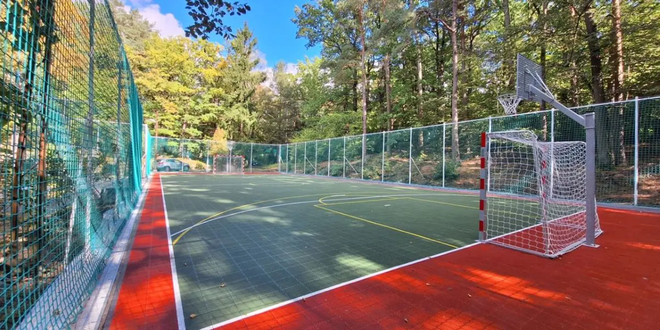 Renovated sports fiels with goals and hoops